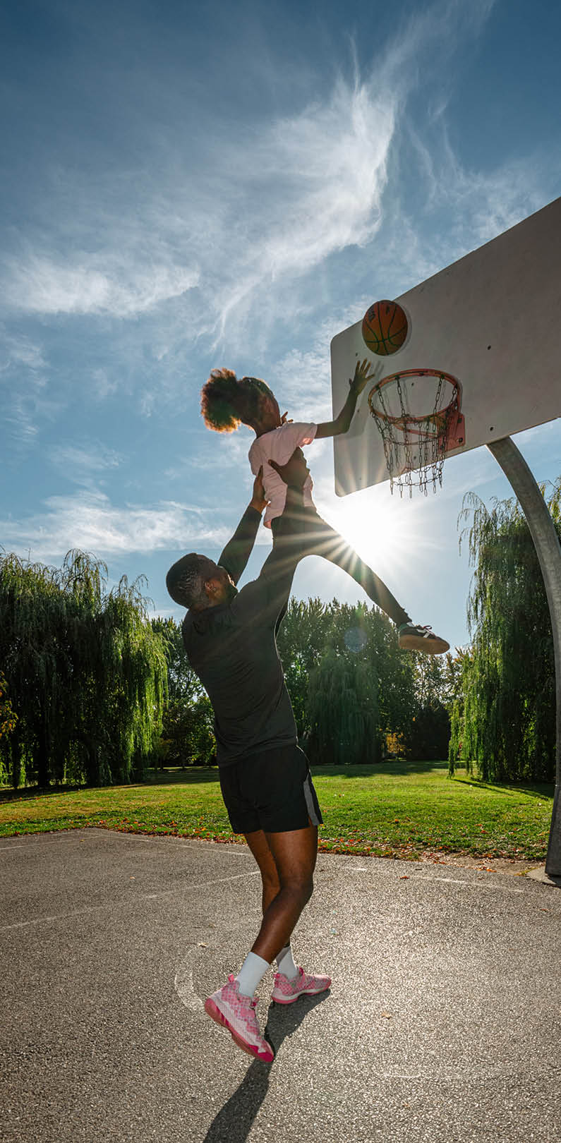 A man is jumping in the air to dunk a basketball. AI generated content
