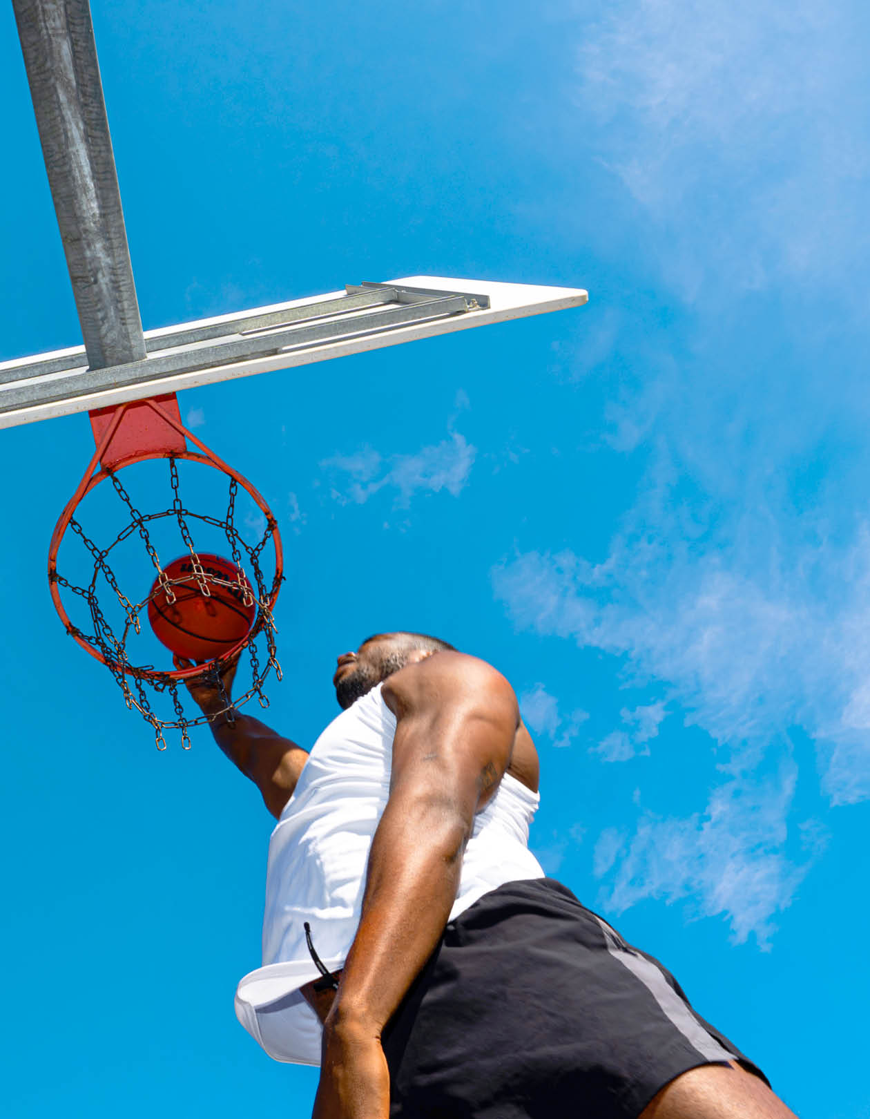 A man is jumping in the air to dunk a basketball. AI generated content
